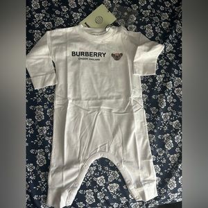 Brand new with tag, Burberry, baby onesie, featuring the Burberry bear.